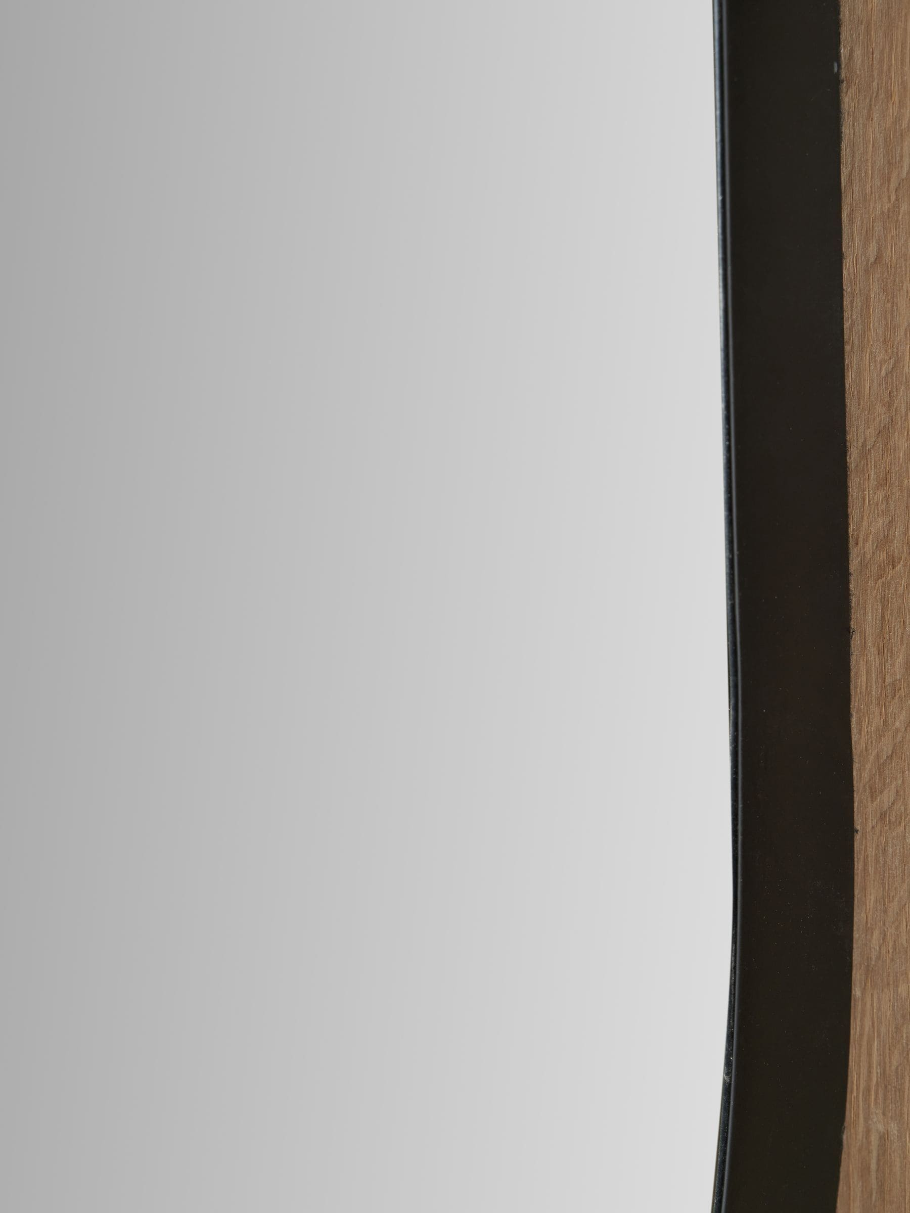 Pacific black metal slim frame oval wall mirror 90x60cm - British product