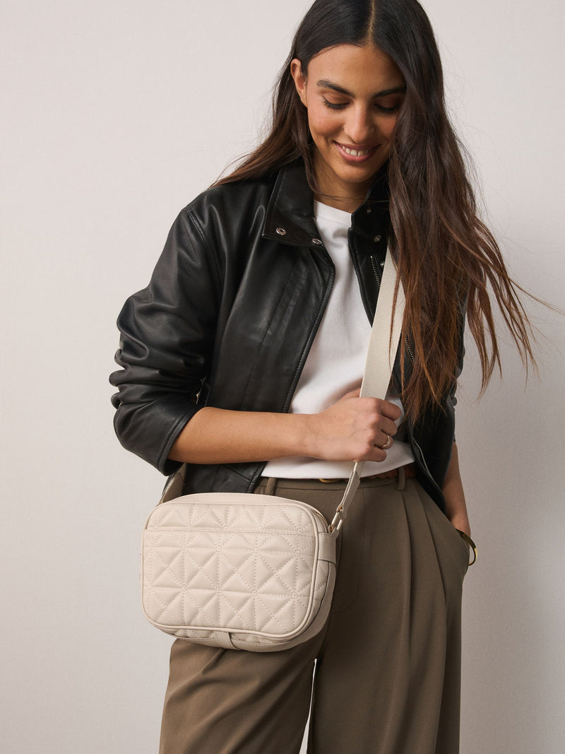 Bone quilted camera bag with adjustable strap (British brand)