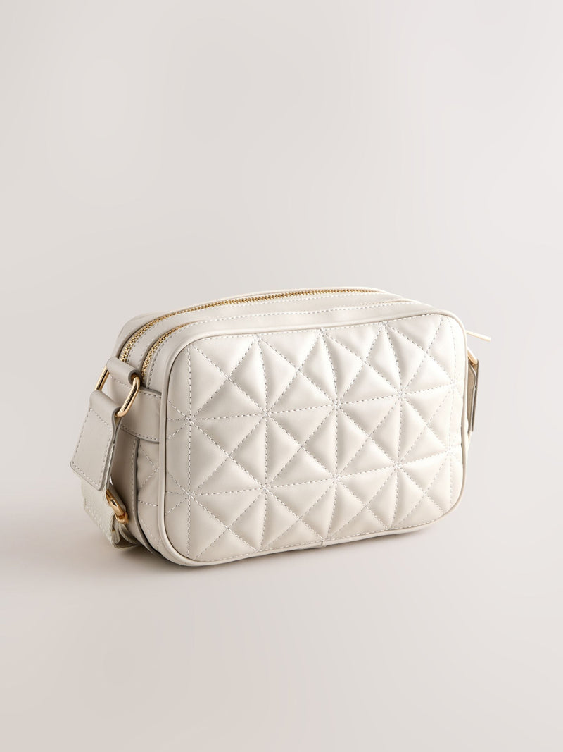Bone quilted camera bag with adjustable strap (British brand)