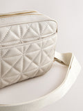 Bone quilted camera bag with adjustable strap (British brand)