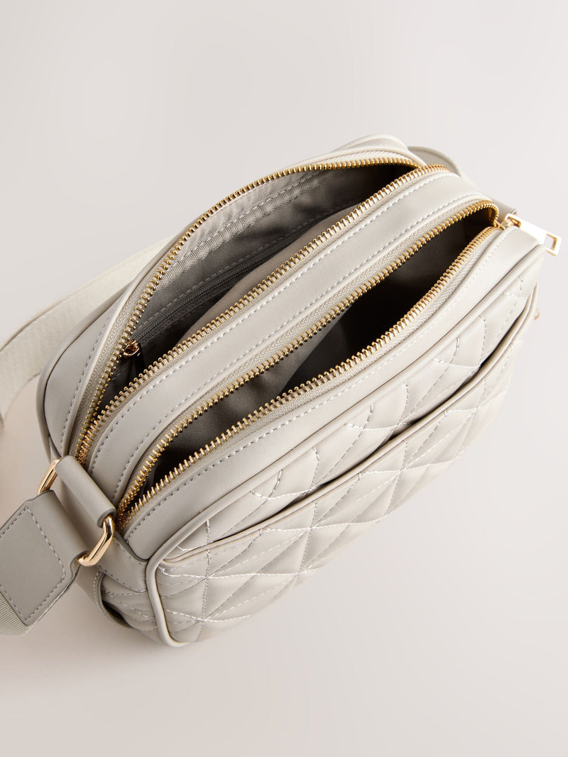 Bone quilted camera bag with adjustable strap (British brand)