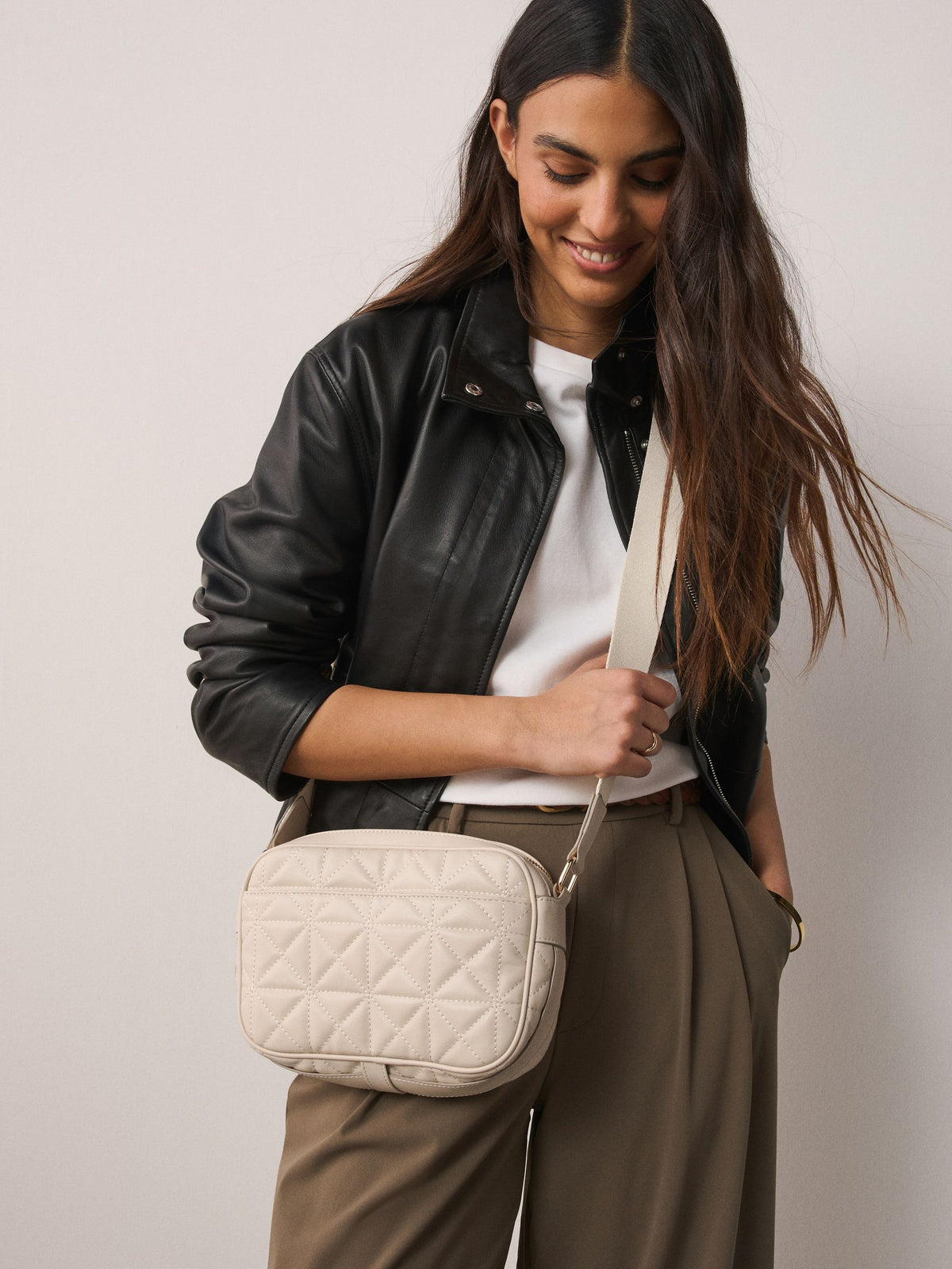 Bone quilted camera bag with adjustable strap (British brand)