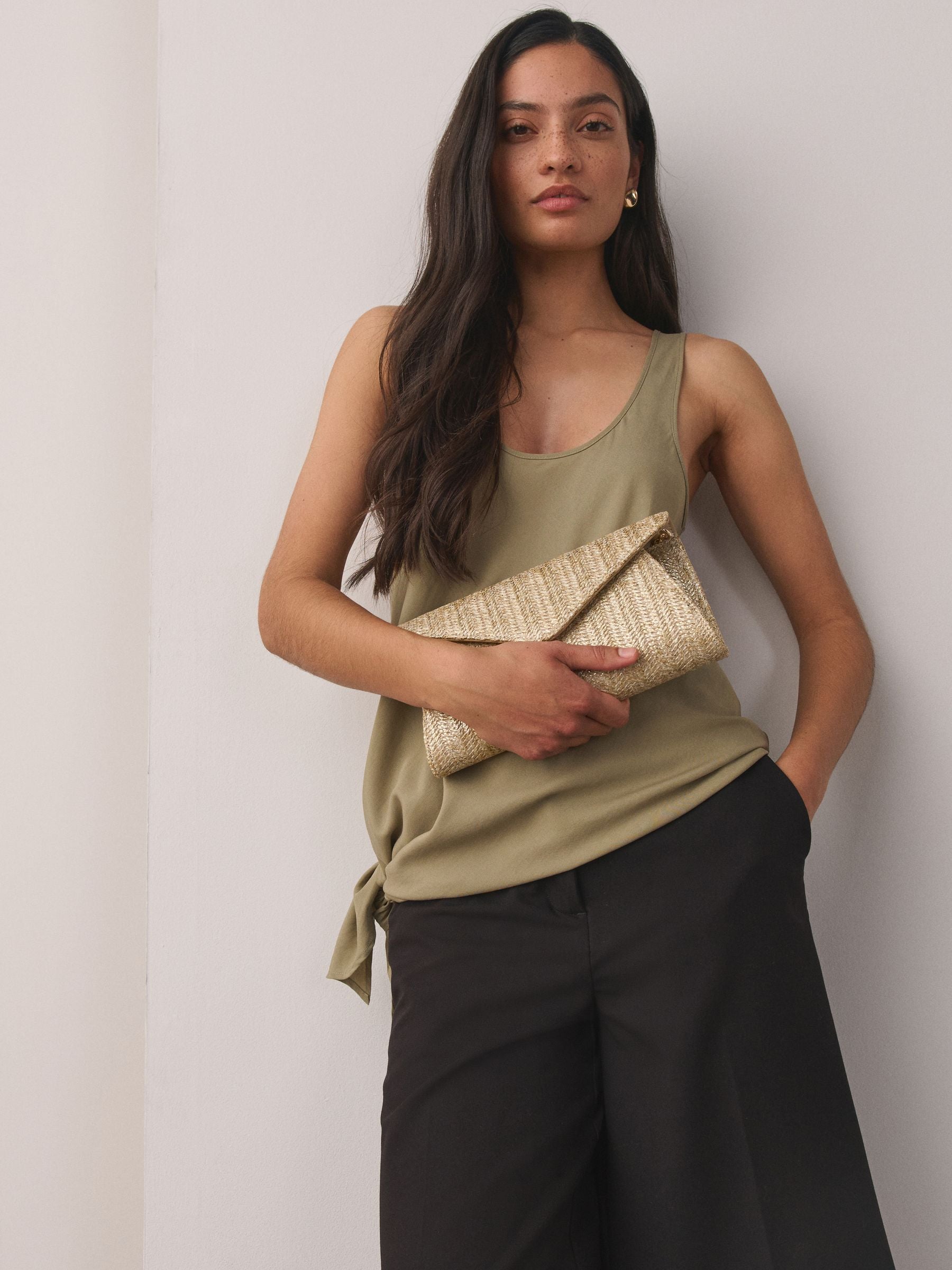 Gold metallic raffia effect clutch bag, imported from the UK