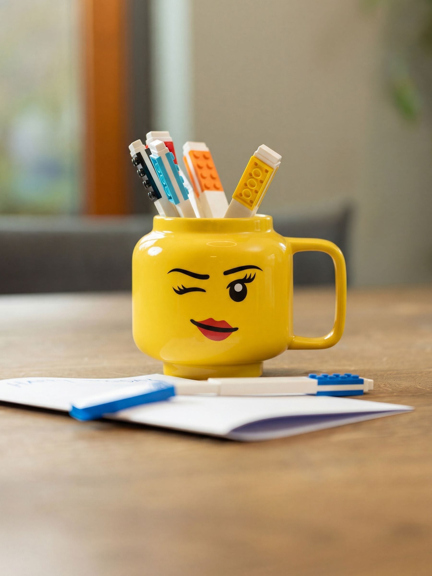 Lego winking minifigure head mug 255ml, UK version