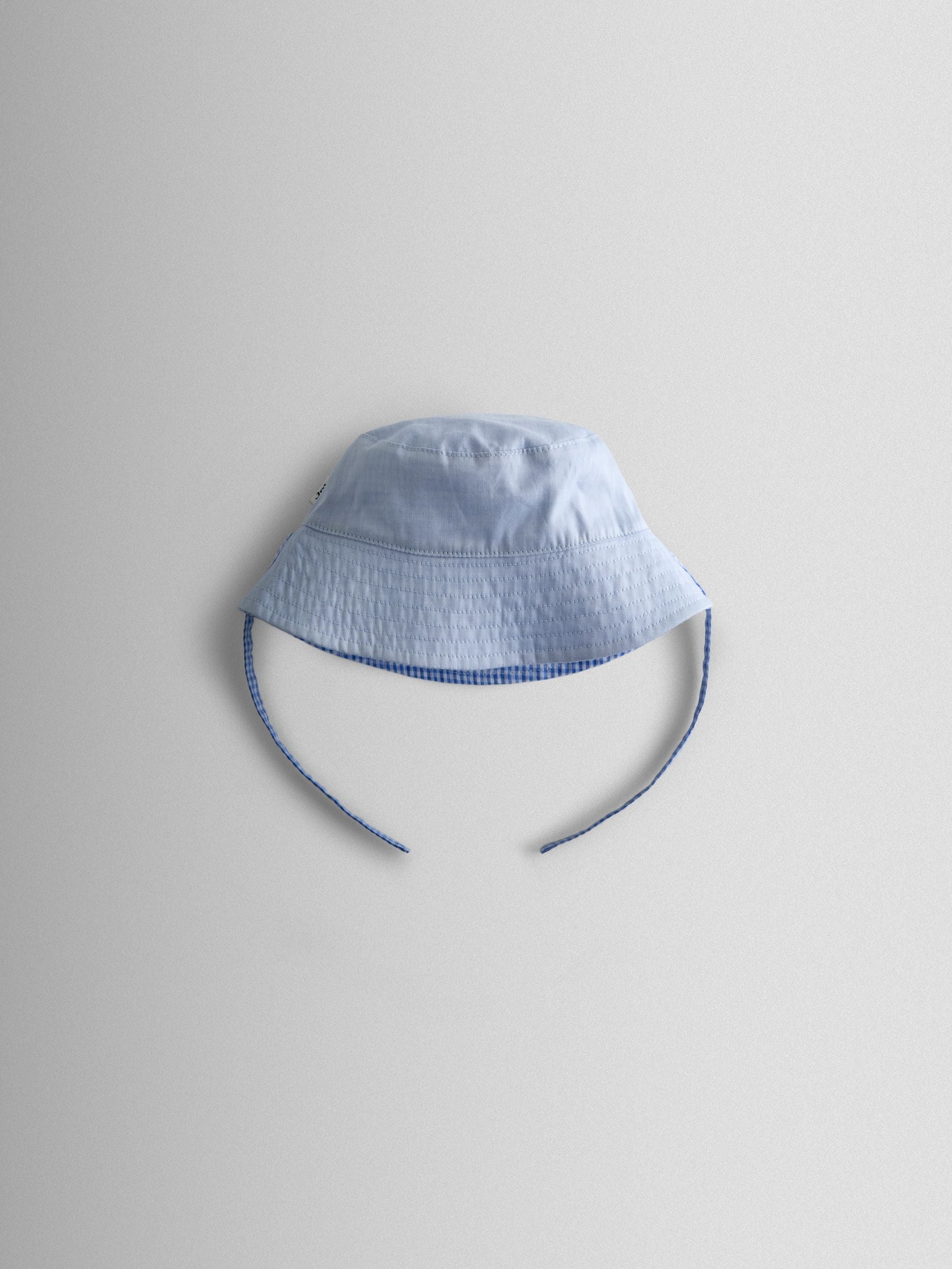 JoJo Maman Bébé light blue gingham reversible bucket hat (British brand)