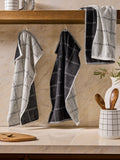 Monochrome checked terry tea towels, imported from the UK