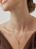 Estella Bartlett lucky cat gold tone necklace, imported from the UK