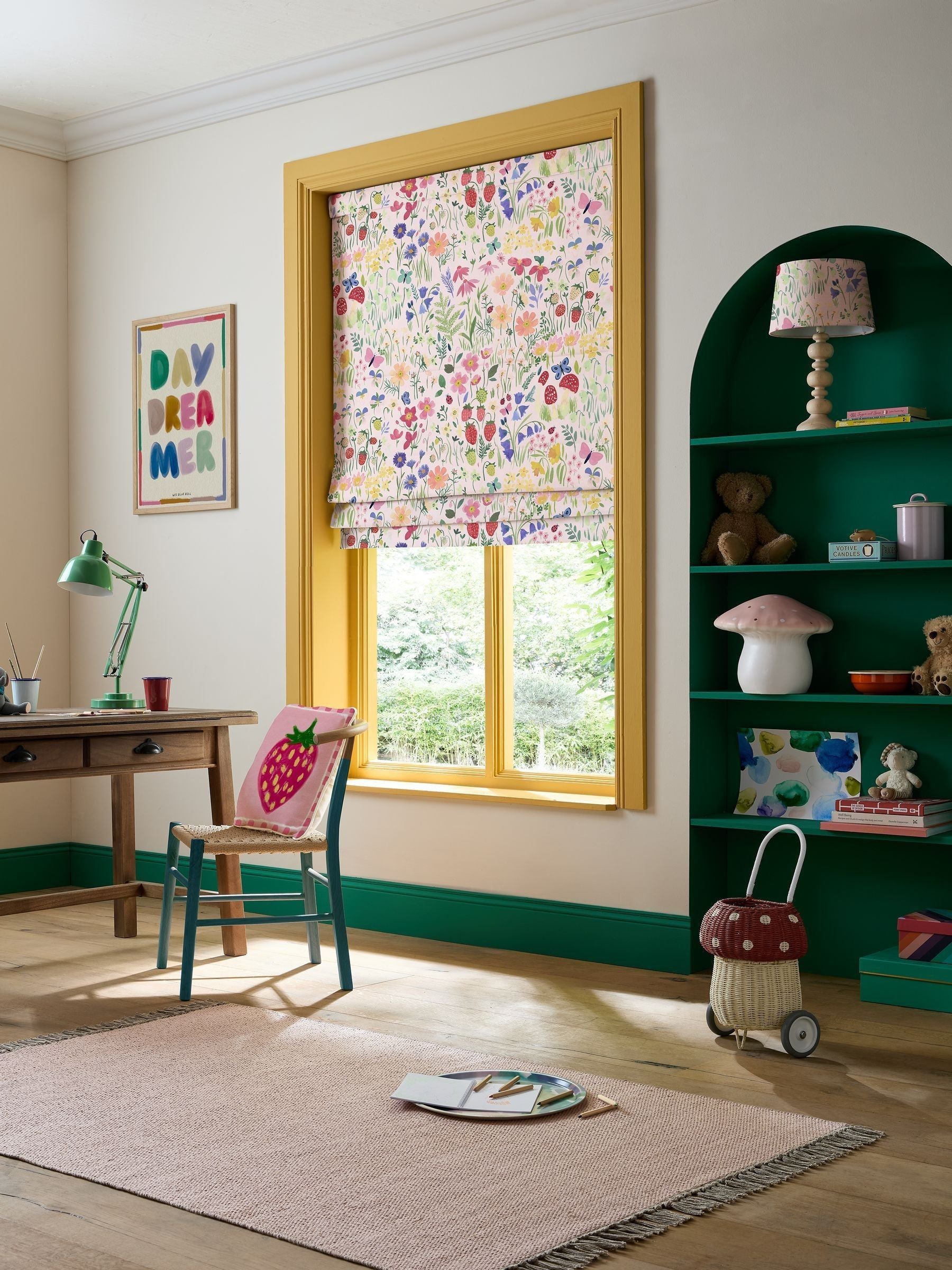 Wee Blue Bell pink roman blind with secret garden design, imported from the UK