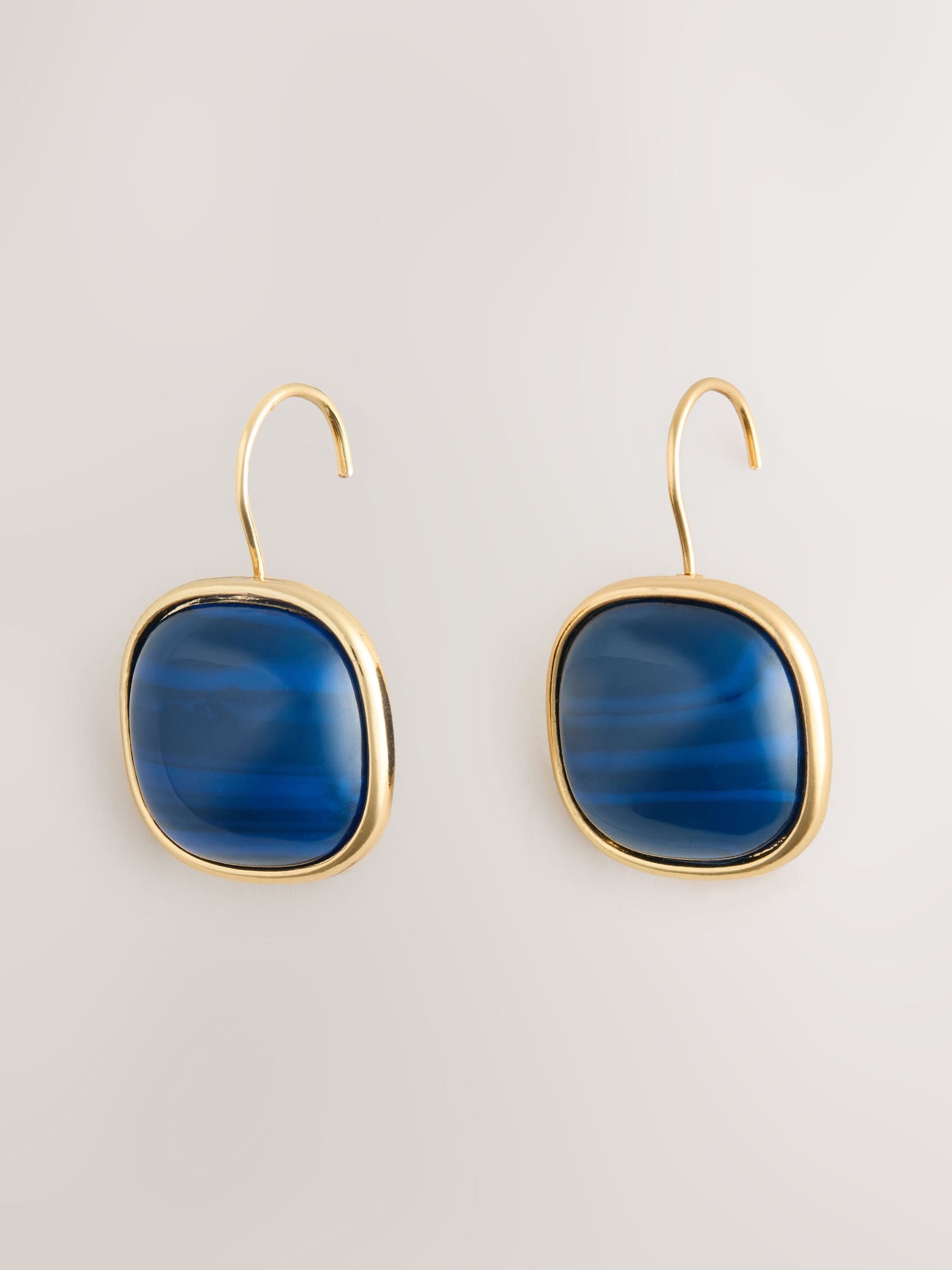 Blue resin pull through earrings (British brand)