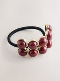 Burgundy resin hair bobble, UK version