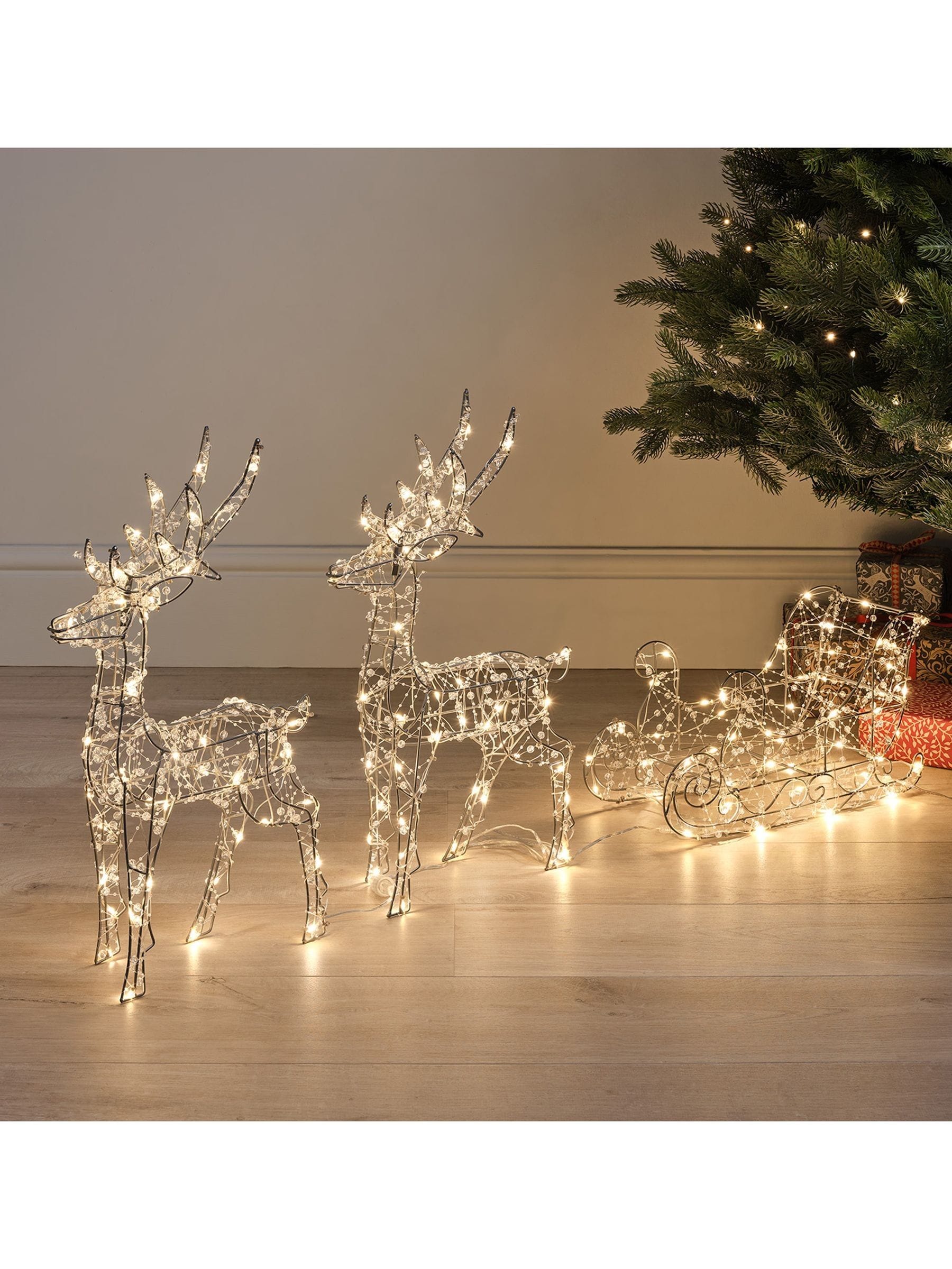 Lights4fun warm white beaded micro reindeer and sleigh set, imported from the UK