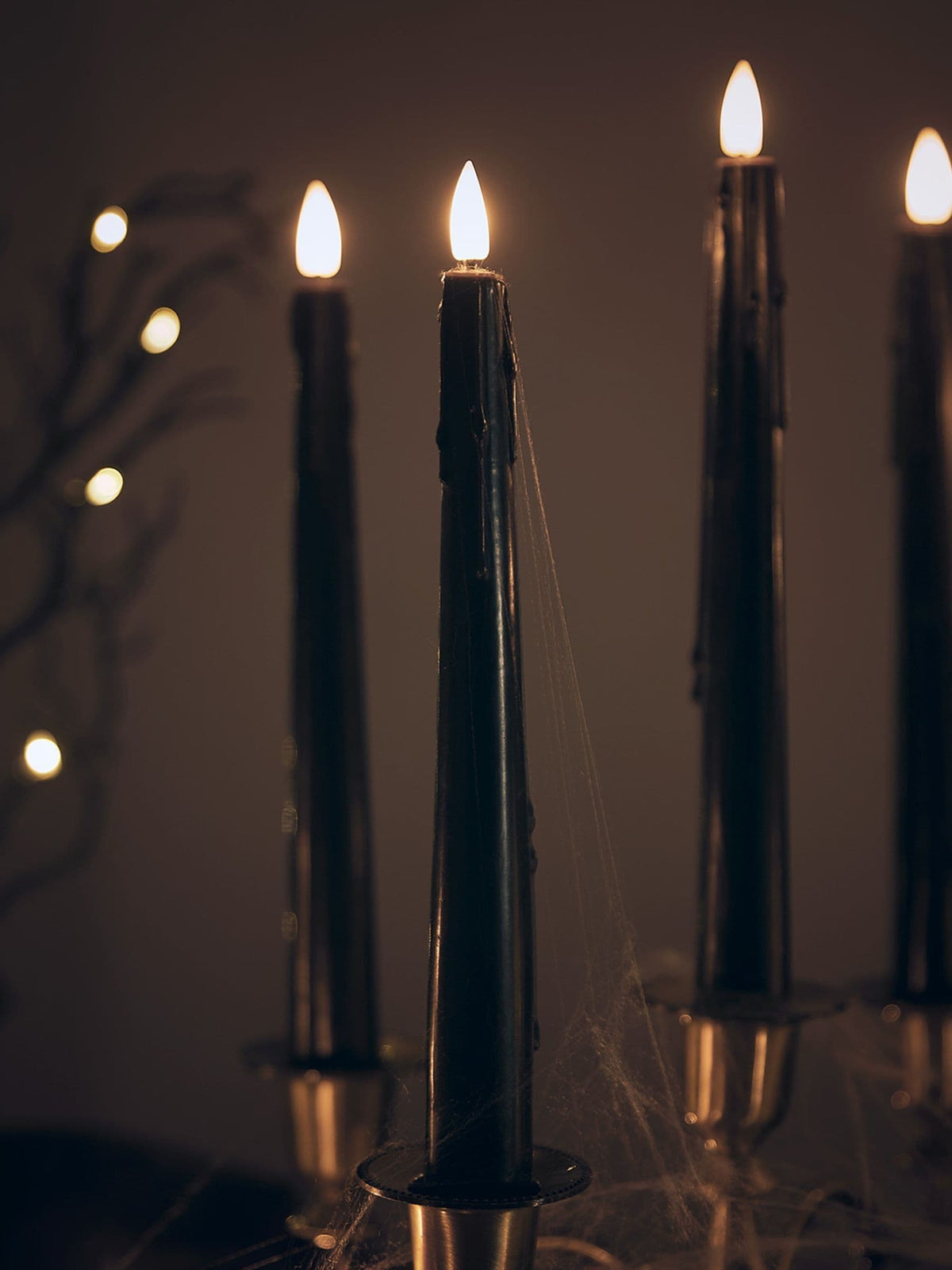 Lights4fun black dripping LED taper candles set of 4, UK version