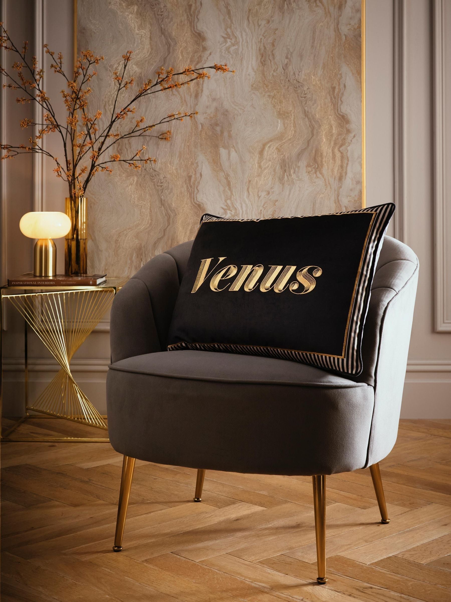 Laurence Llewelyn-Bowen black velvet cushion with gold embroidered Venus, UK version
