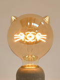 Oliver Bonas cat light bulb copper tint glass (British brand)