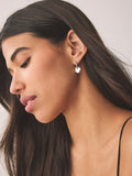 Small hammered disc earrings in silver tone - British product