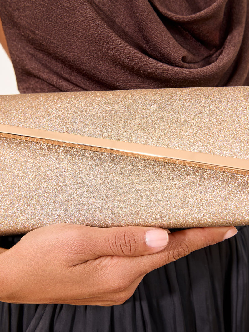 Lipsy gold glitter asymmetric clutch bag, UK version