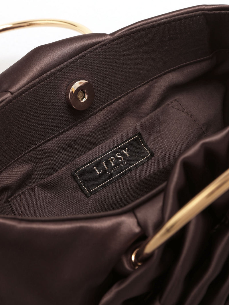Lipsy chocolate brown satin corsage top handle bag (British brand)
