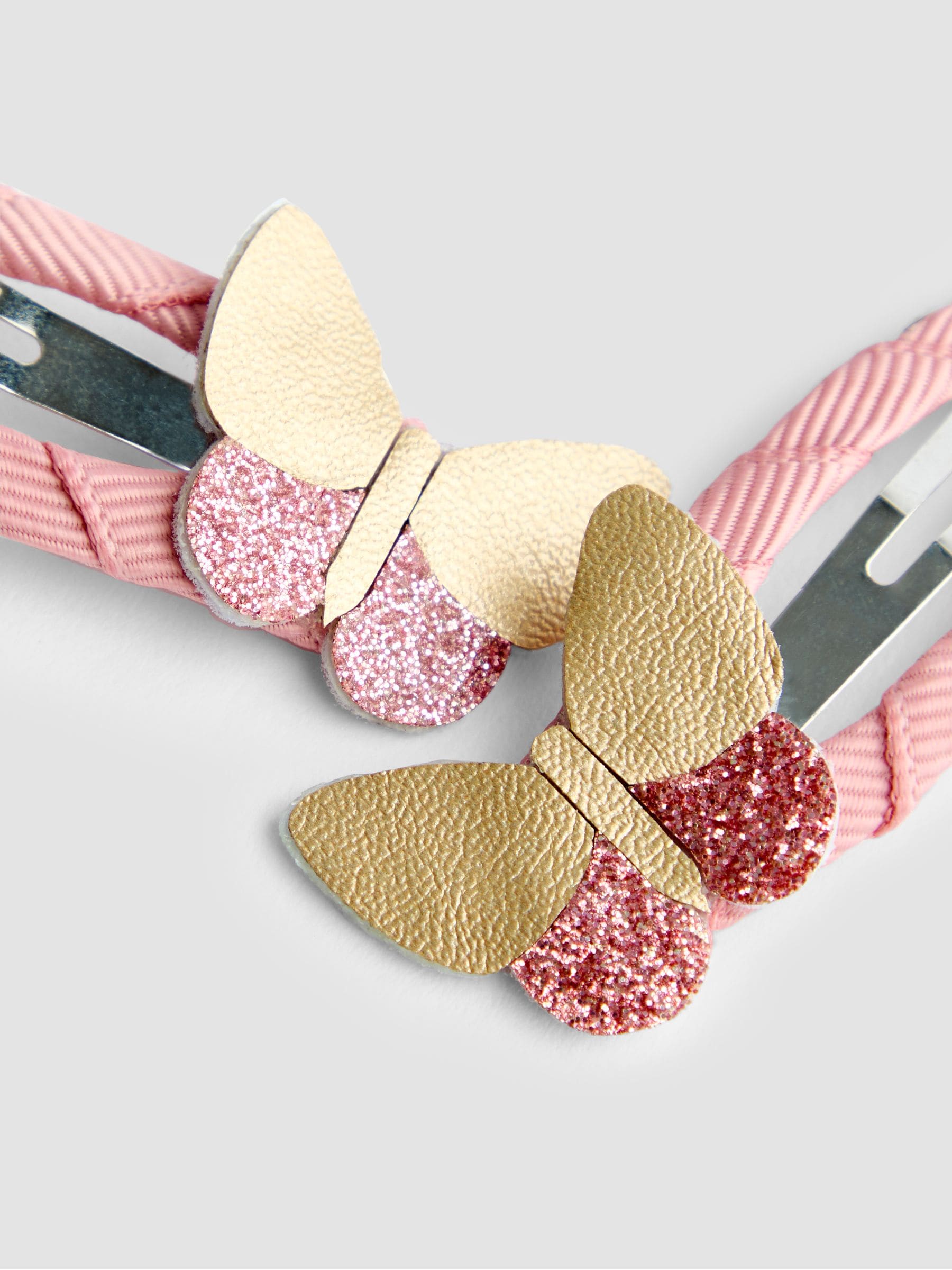 JoJo Maman Bébé pink butterfly clip 2-pack, imported from the UK
