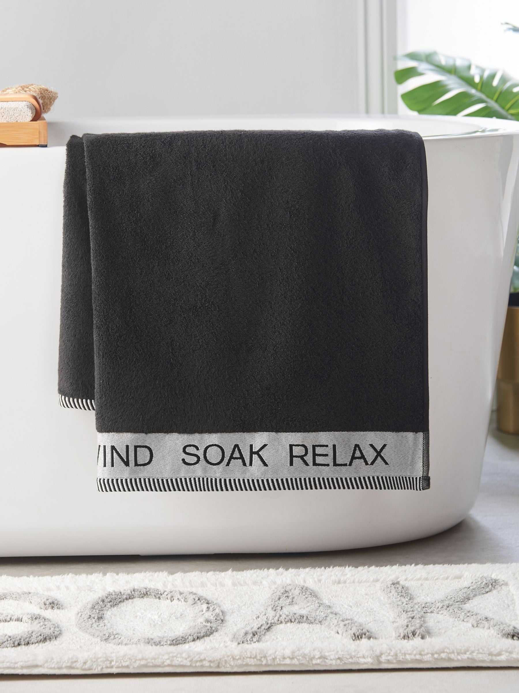 Catherine Lansfield Black Relax and Unwind towel collection (British brand)