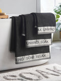 Catherine Lansfield Black Relax and Unwind towel collection (British brand)