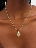 Jon Richard gold tone diamond cut peardrop pendant (British brand)