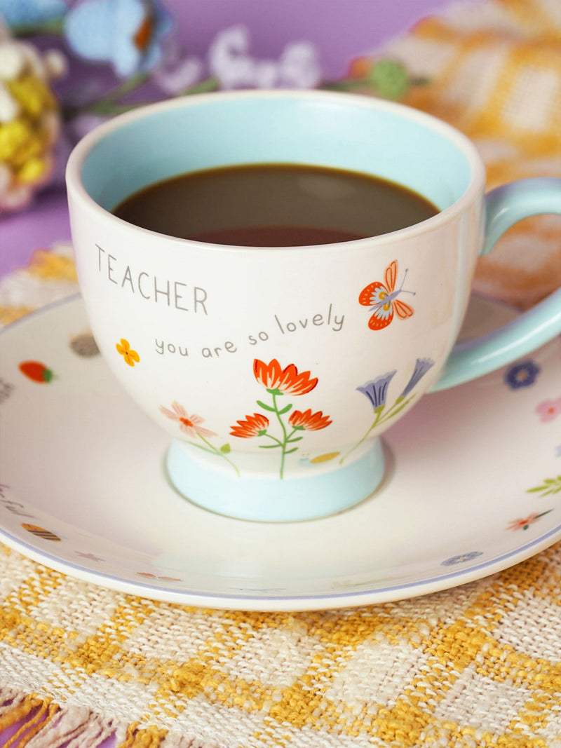 Widdop cream teacup and saucer set with teacher message, UK version