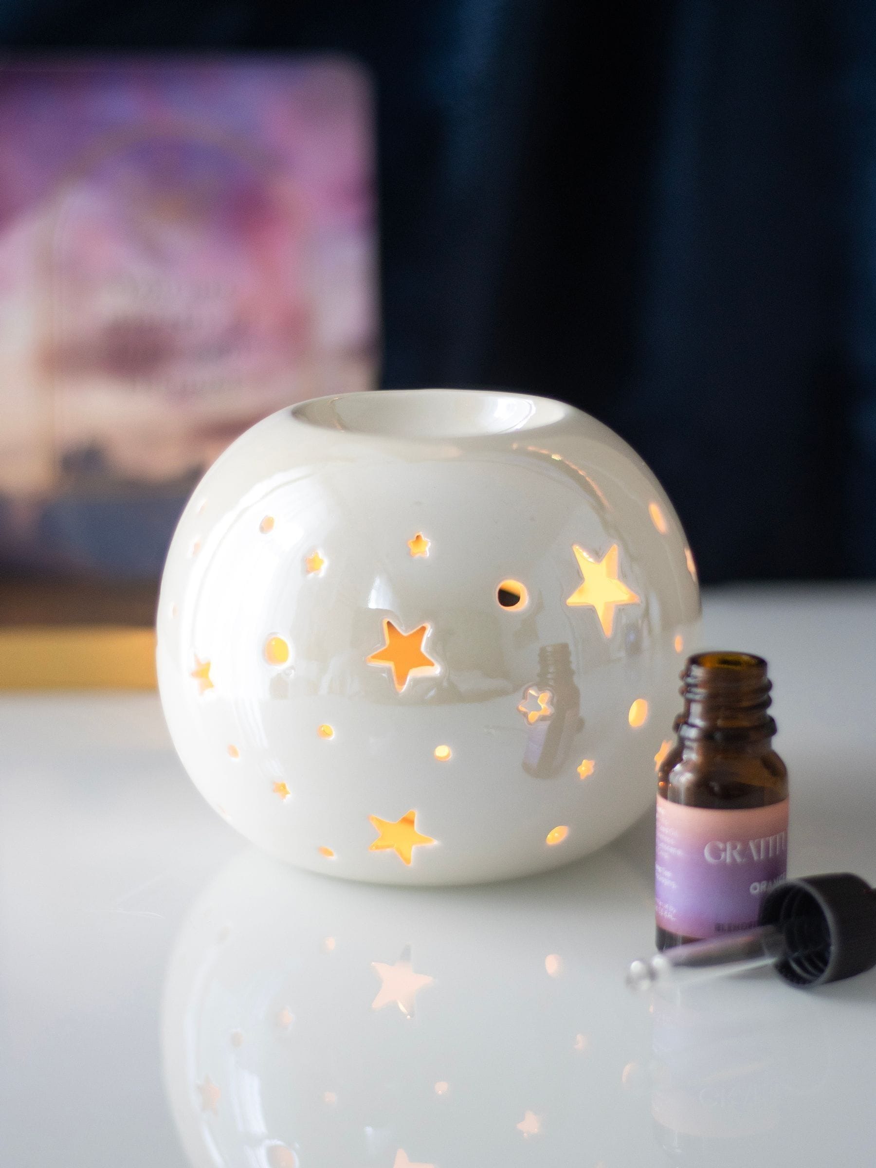 Something Different white iridescent star oil burner ceramic, UK version