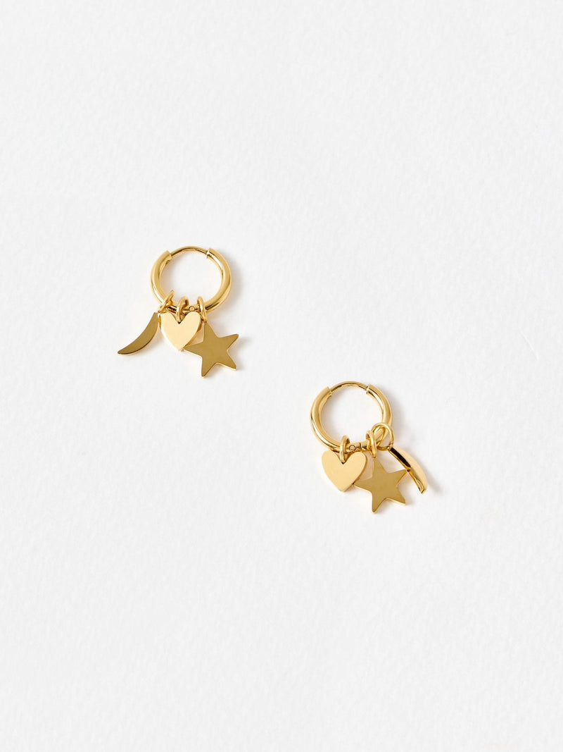 Oliver Bonas gold tone hoop earrings with star moon heart charms (British brand)