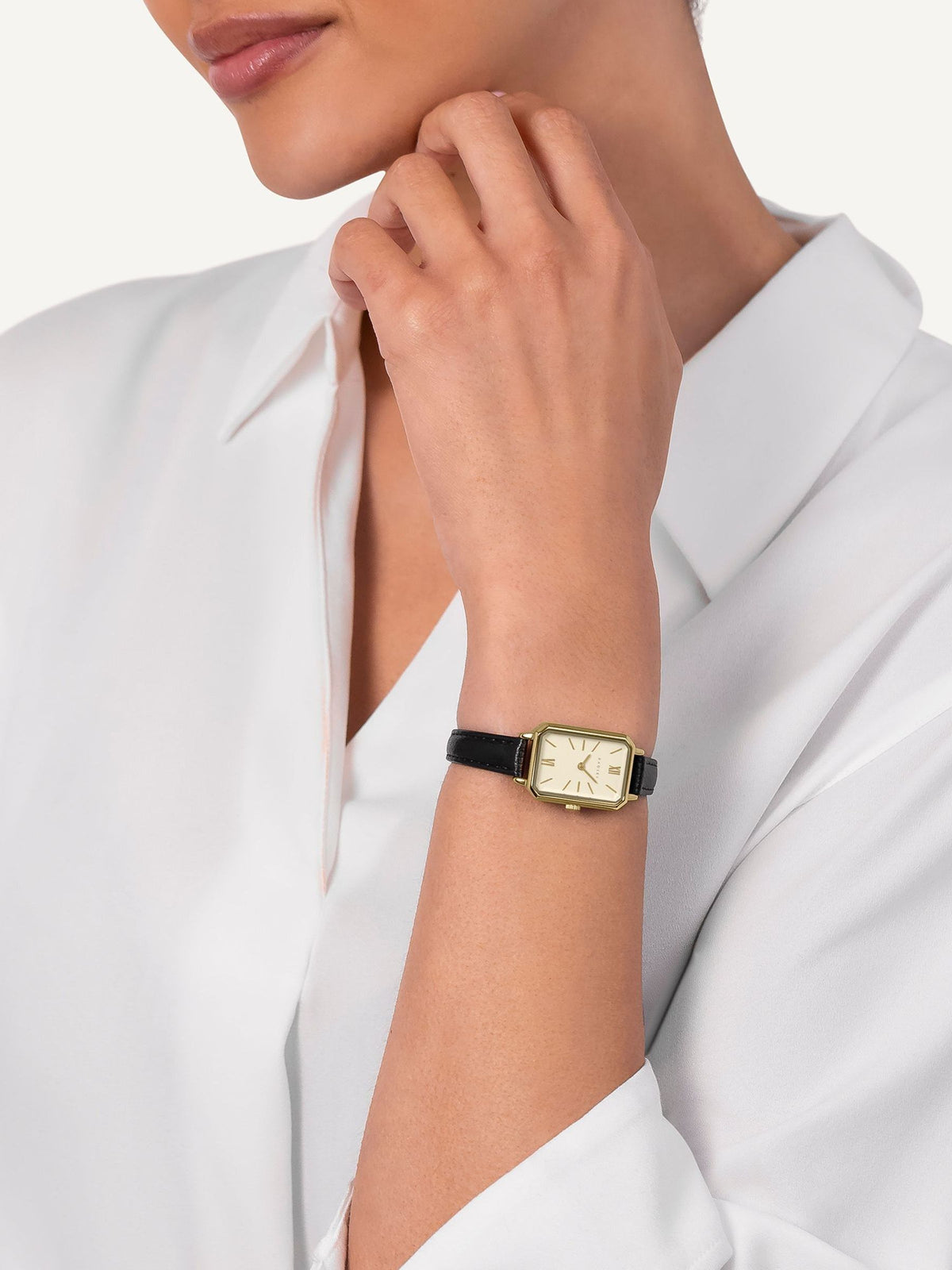 Radley watch with pale gold case and black leather strap - British product
