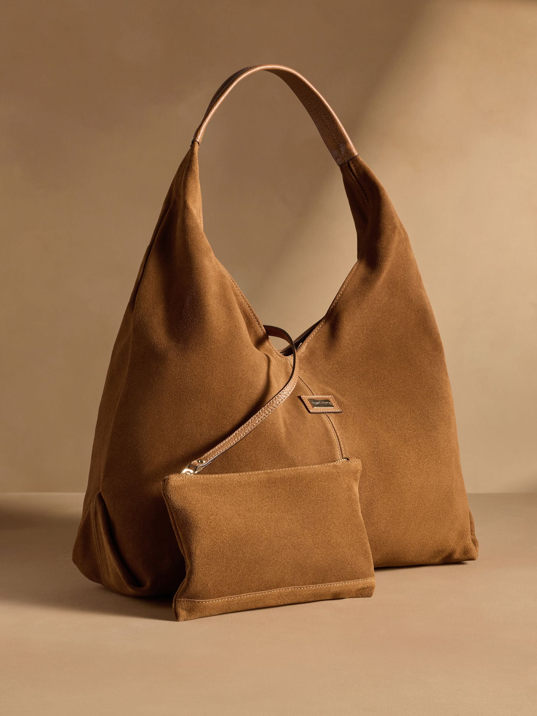Russell & Bromley tan brown oversized leather shoulder bag, imported from the UK