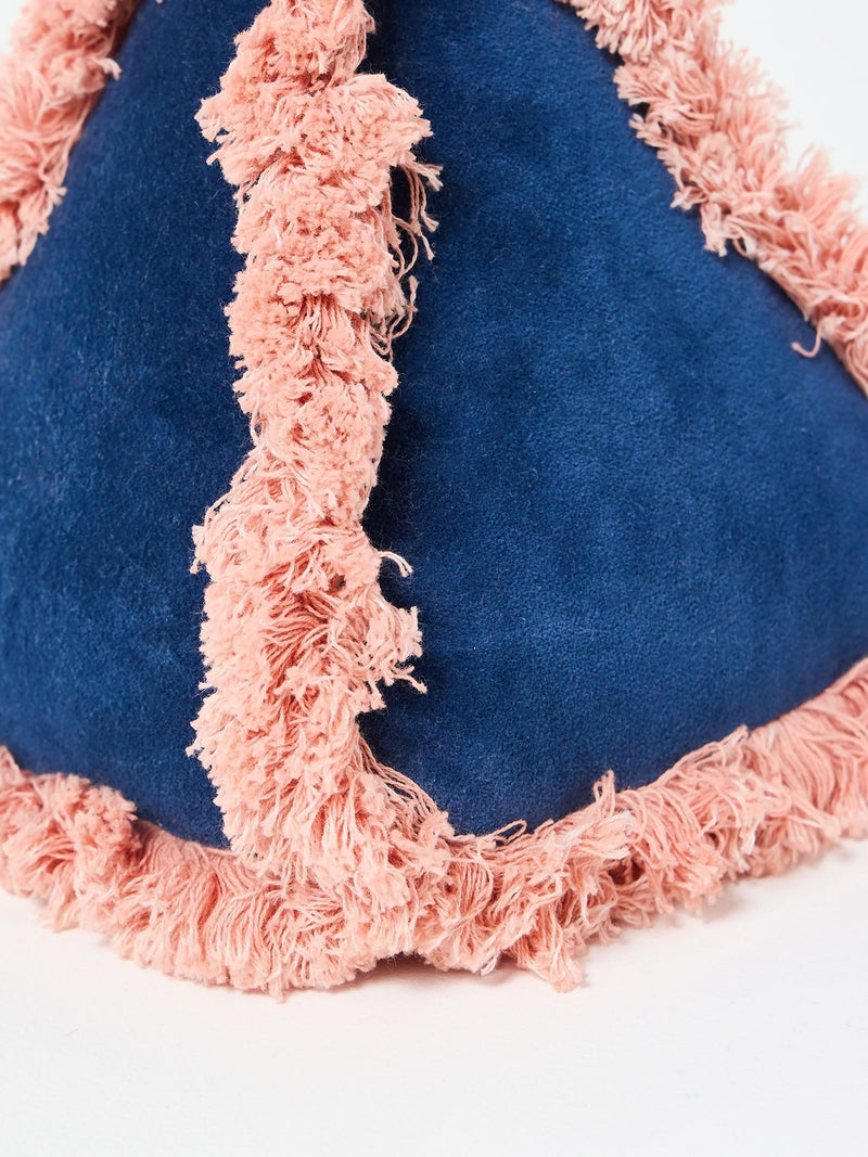 Oliver Bonas blue velvet door stop with pink trim, imported from the UK