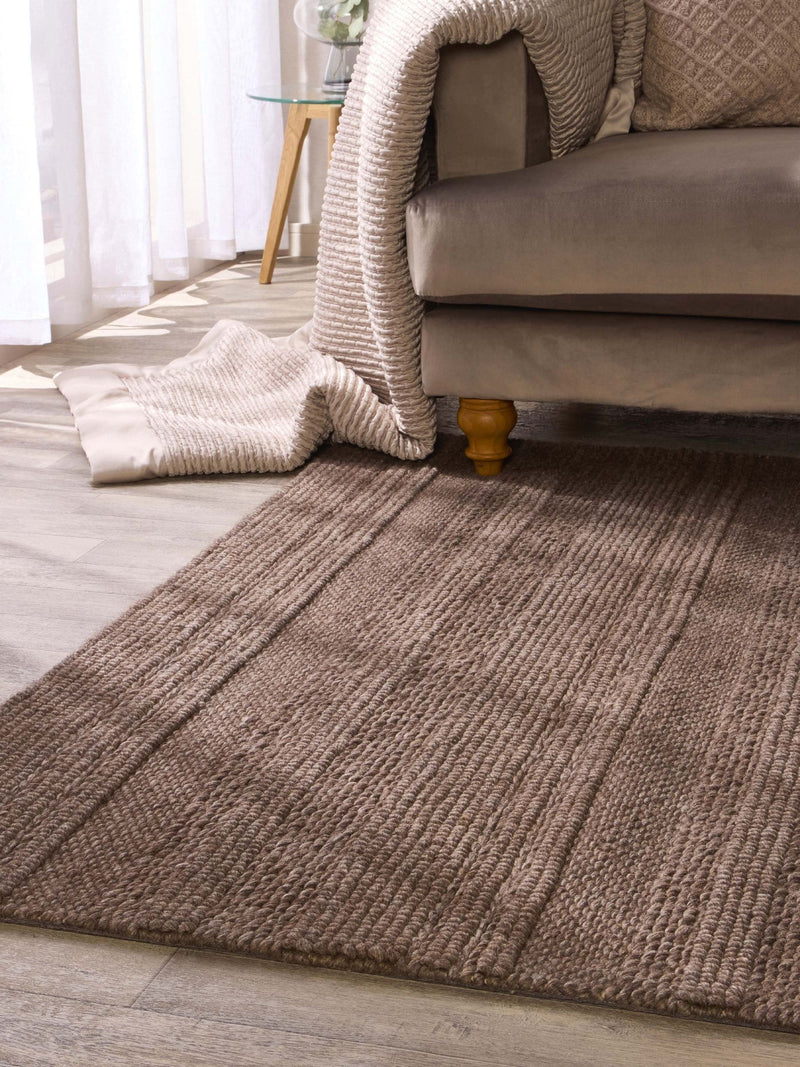 Origin Rugs brown chunky knit rug, hand-woven wool blend (British brand)