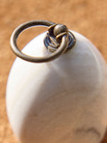 Dibor white marble doorstop with metallic ring, imported from the UK