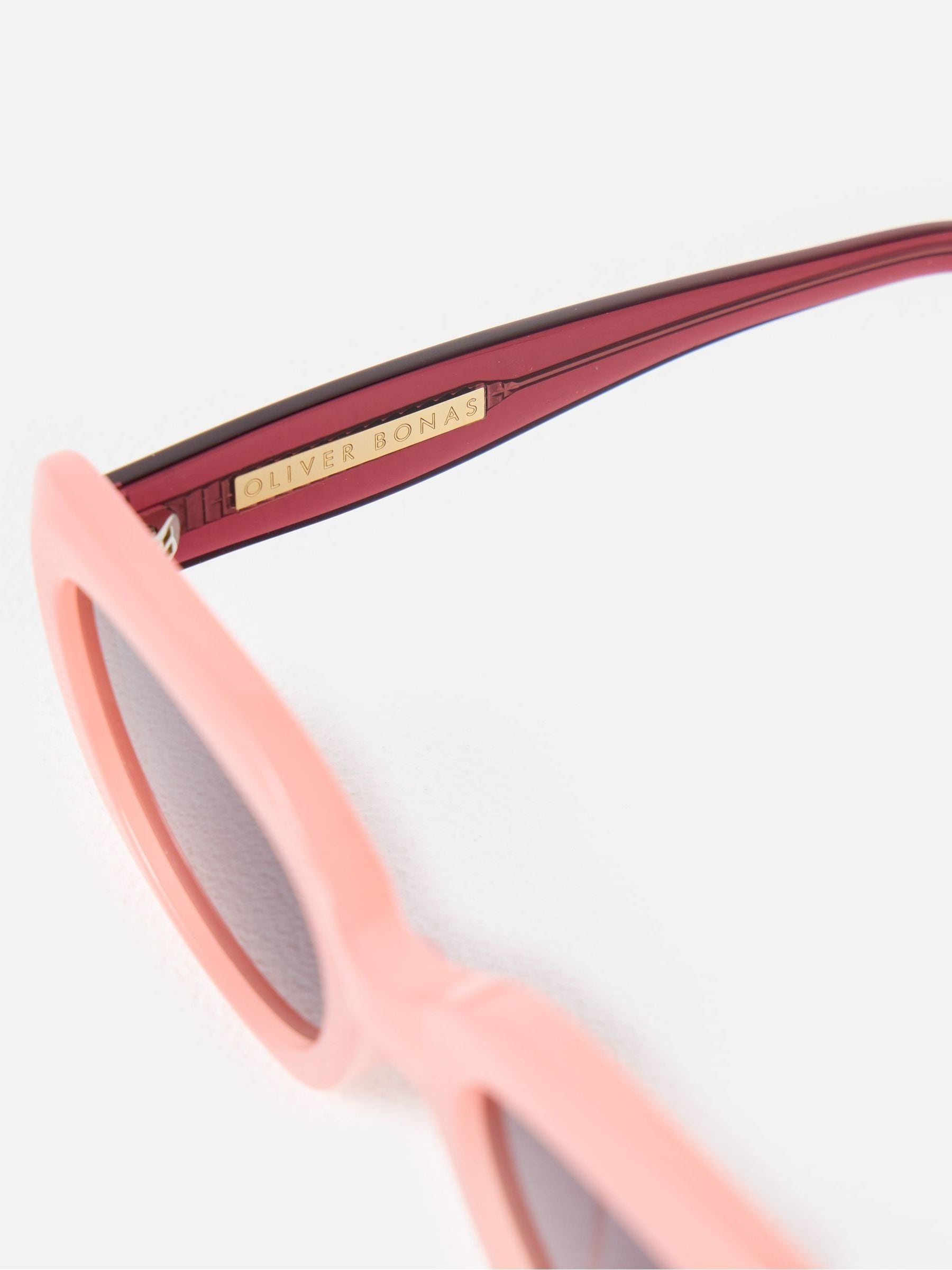 Oliver Bonas pink berry red oval acetate sunglasses, imported from the UK