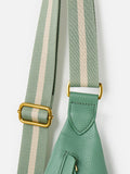 Oliver Bonas sage green belt bag, imported from the UK