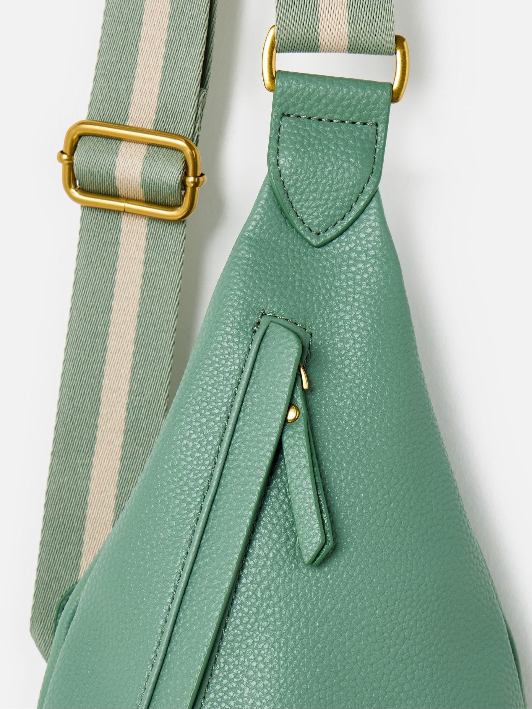 Oliver Bonas sage green belt bag, imported from the UK
