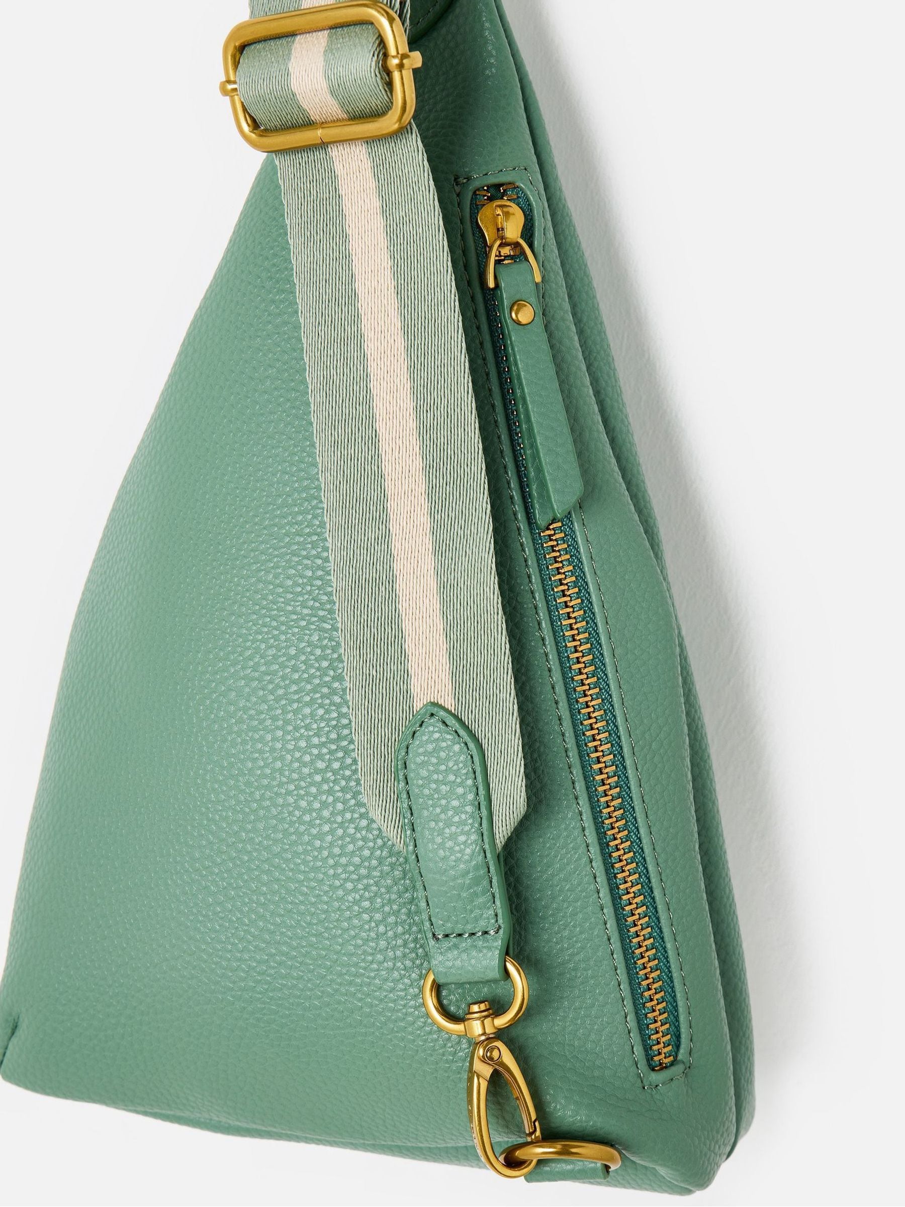 Oliver Bonas sage green belt bag, imported from the UK