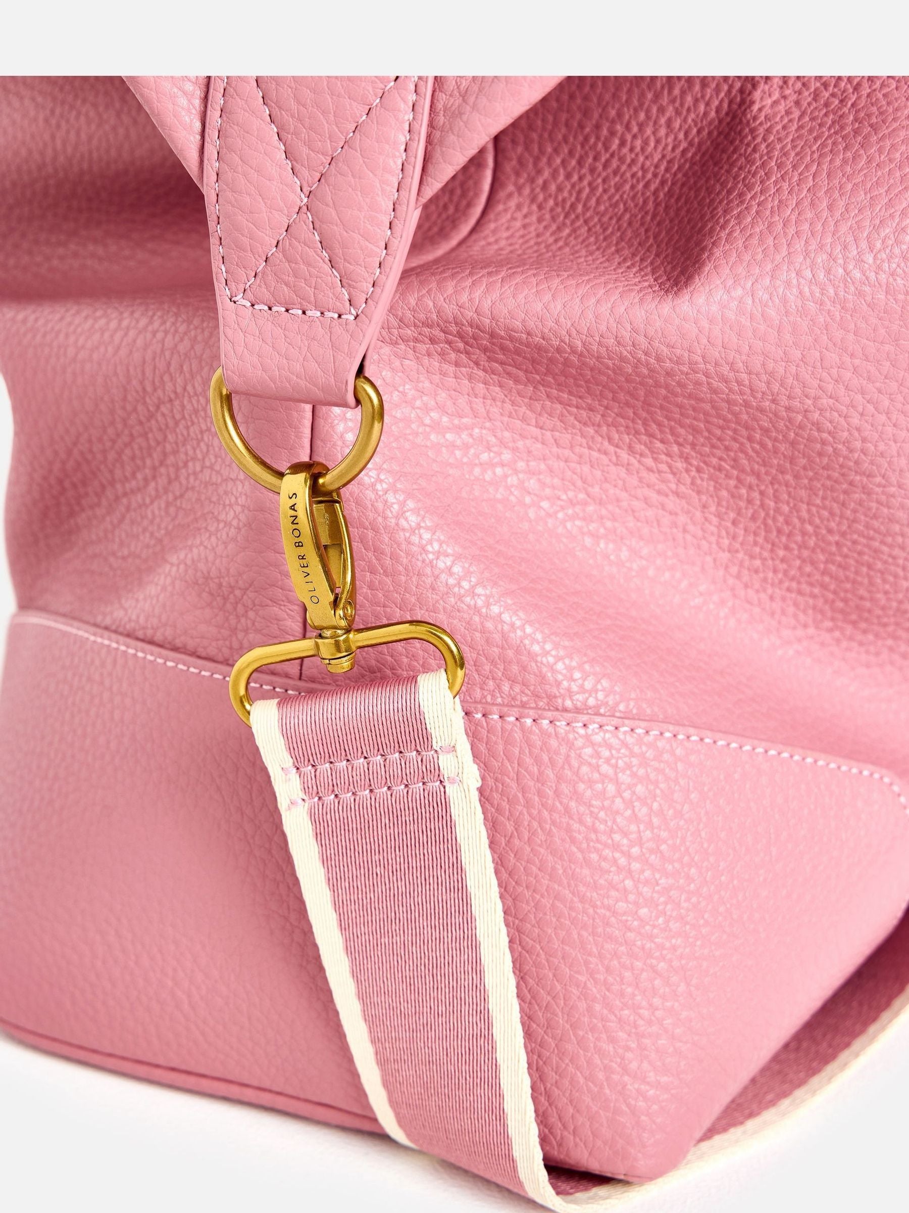 Oliver Bonas dusty pink weekend bag, imported from the UK