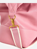 Oliver Bonas dusty pink weekend bag, imported from the UK