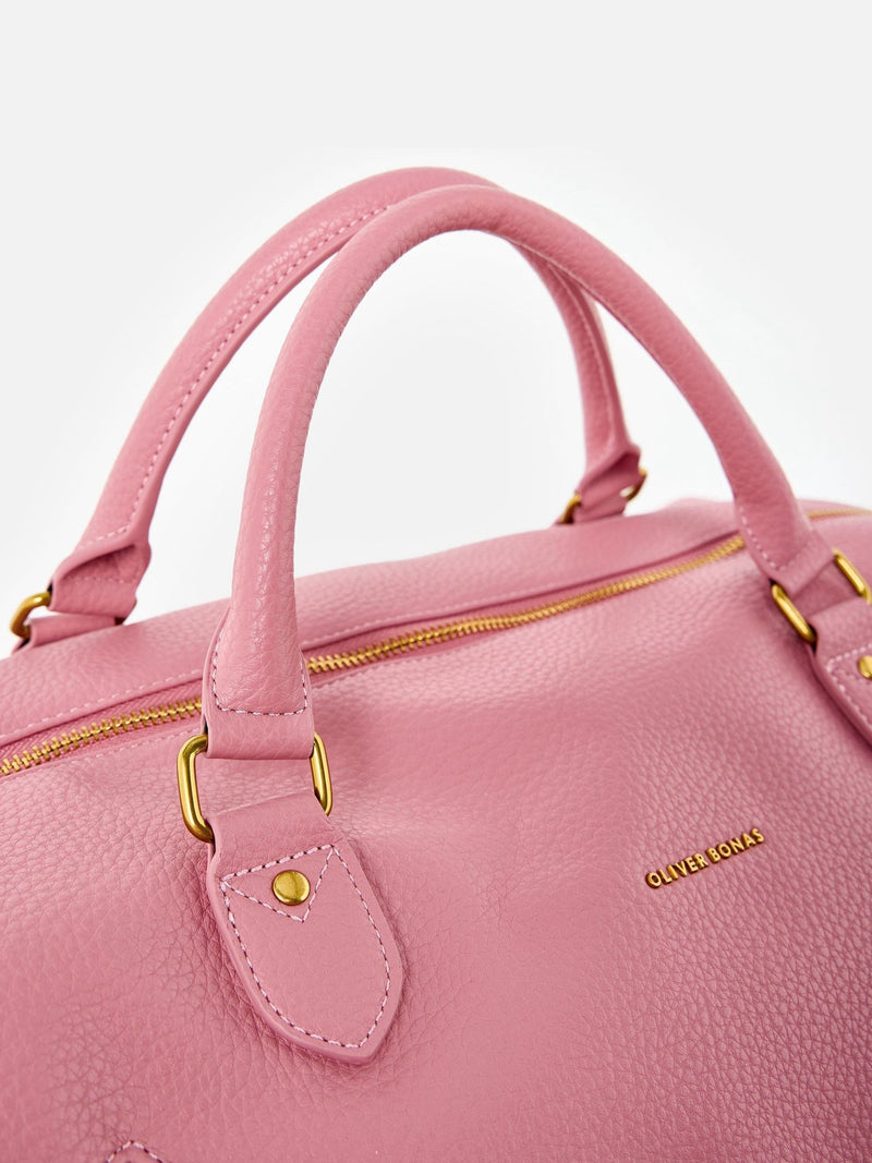 Oliver Bonas dusty pink weekend bag, imported from the UK