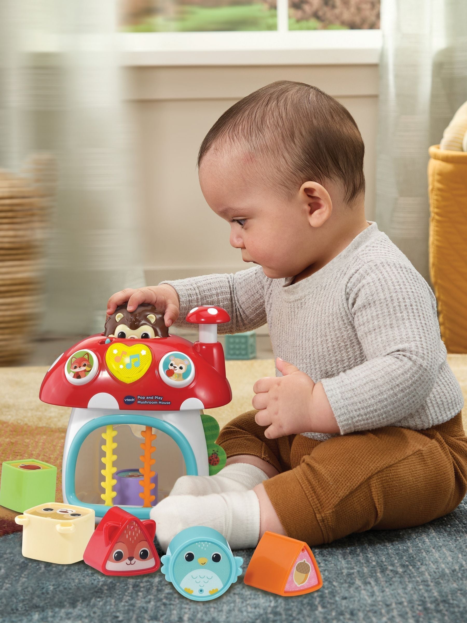 V-Tech Pop and Play Mushroom House toy, UK version