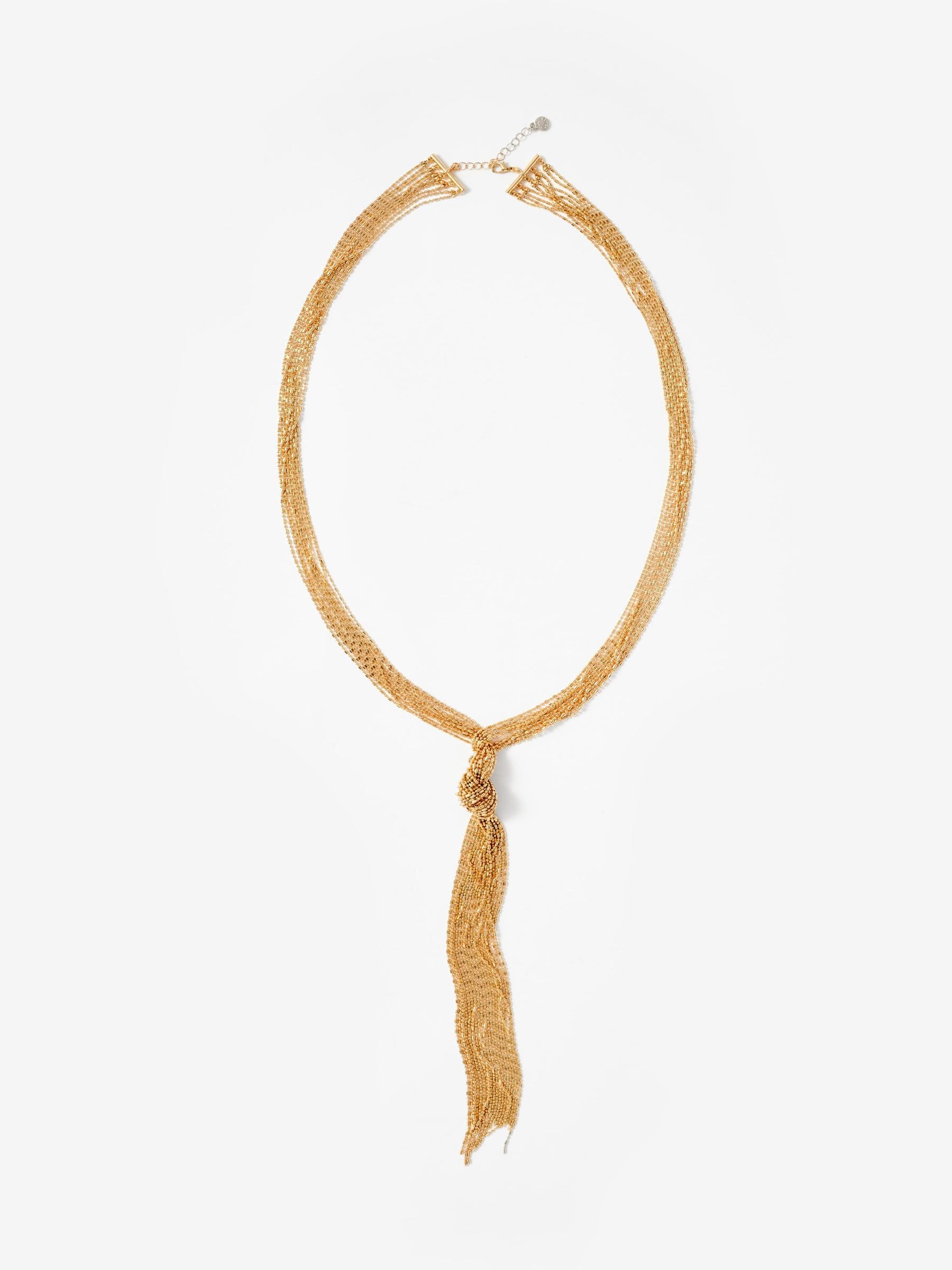 Mint Velvet gold tone long fringe knotted pendant, UK version