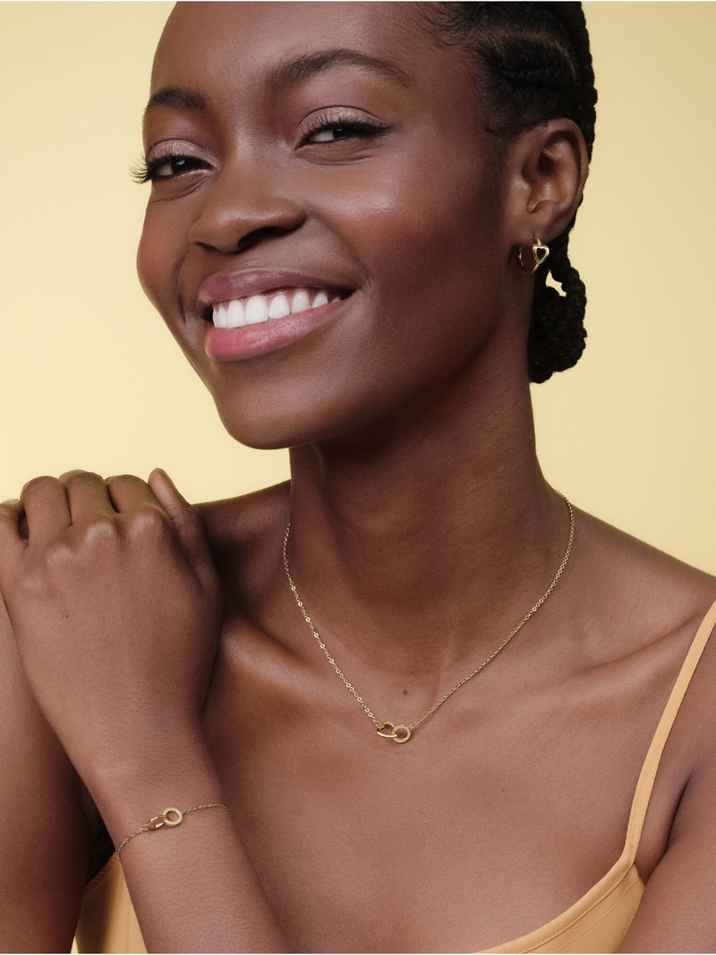 Olivia Burton gold tone heart hoop earrings, UK version