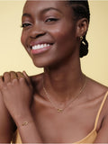 Olivia Burton gold tone heart hoop earrings, UK version