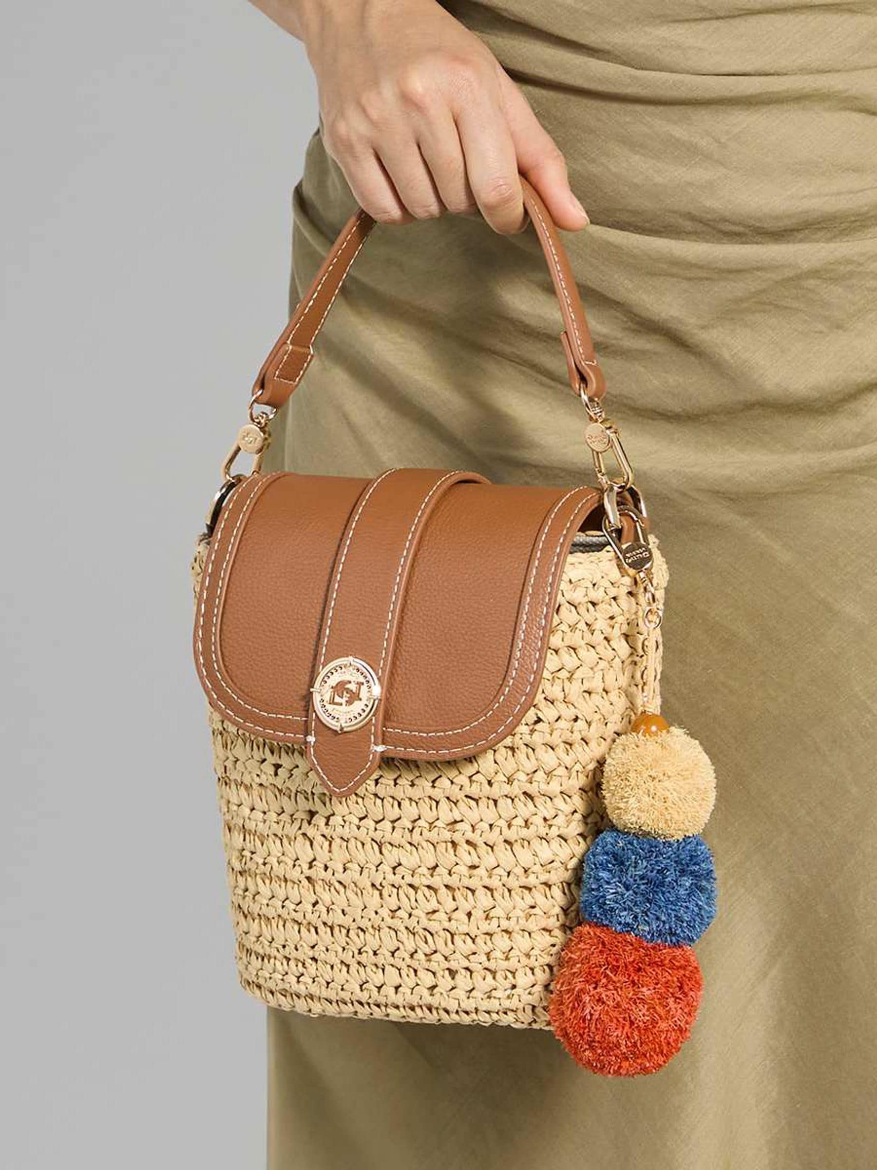 Dune London Dimple cross-body bag in synthetic raffia (British brand)