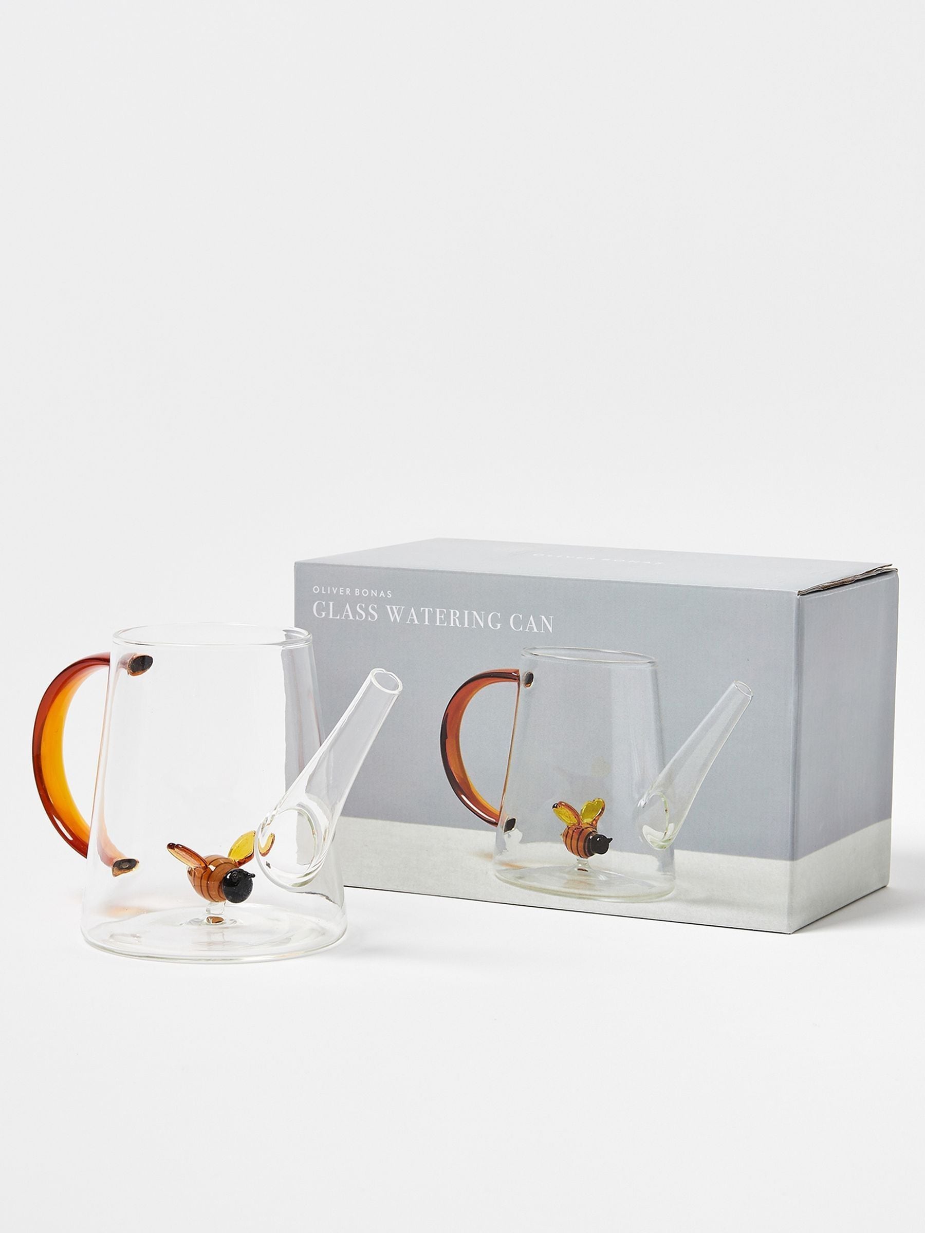 Oliver Bonas clear glass bee watering can 13cm, imported from the UK