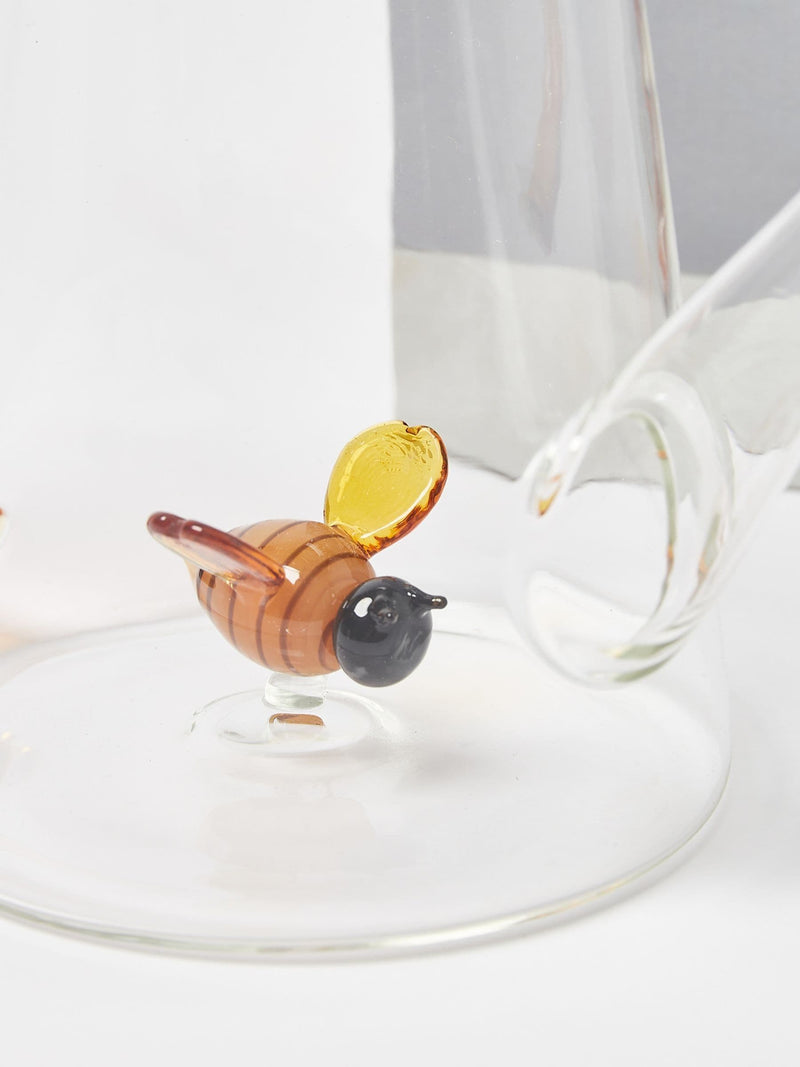 Oliver Bonas clear glass bee watering can 13cm, imported from the UK