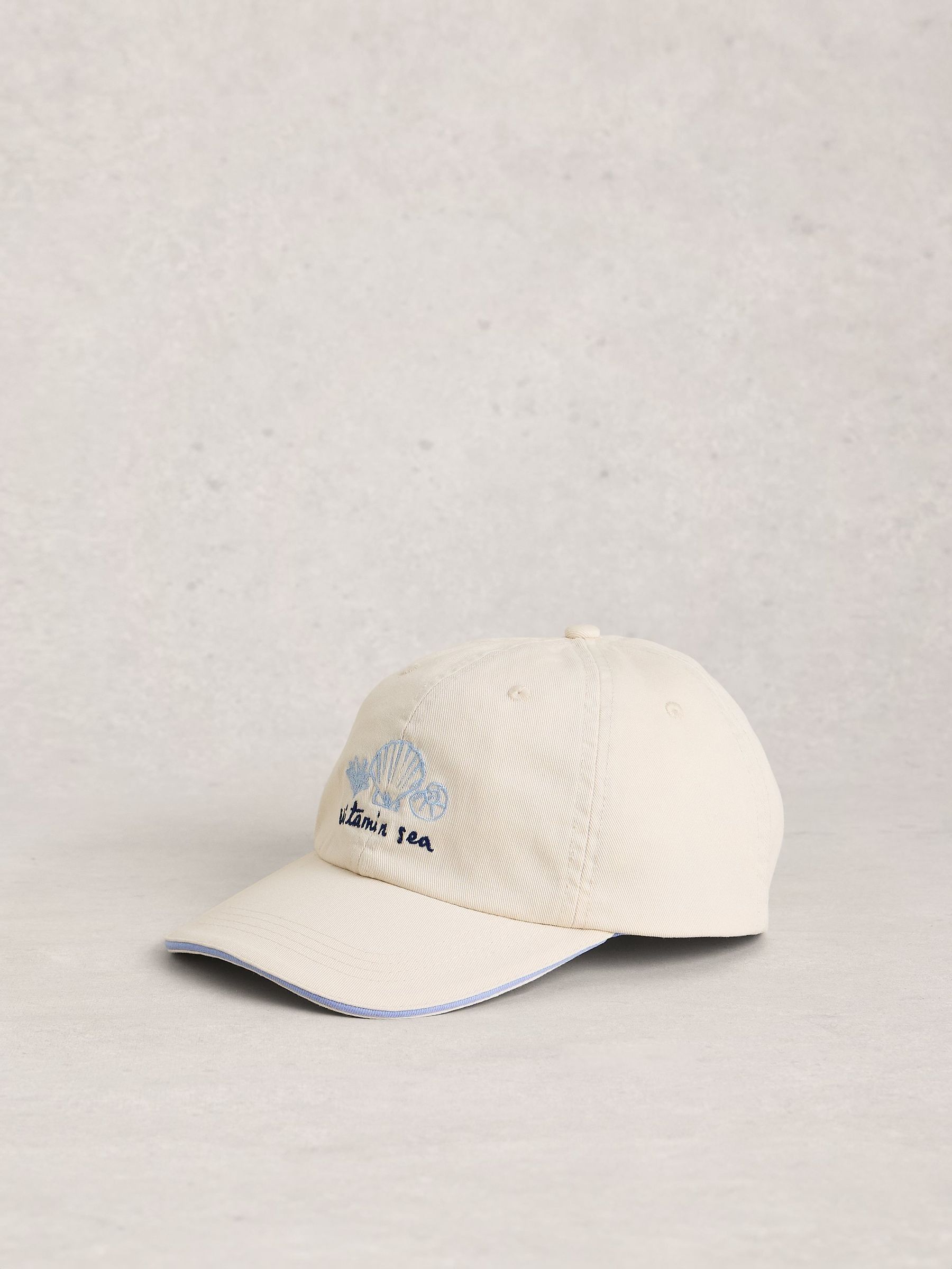 White Stuff natural embroidered shell cap (British brand)