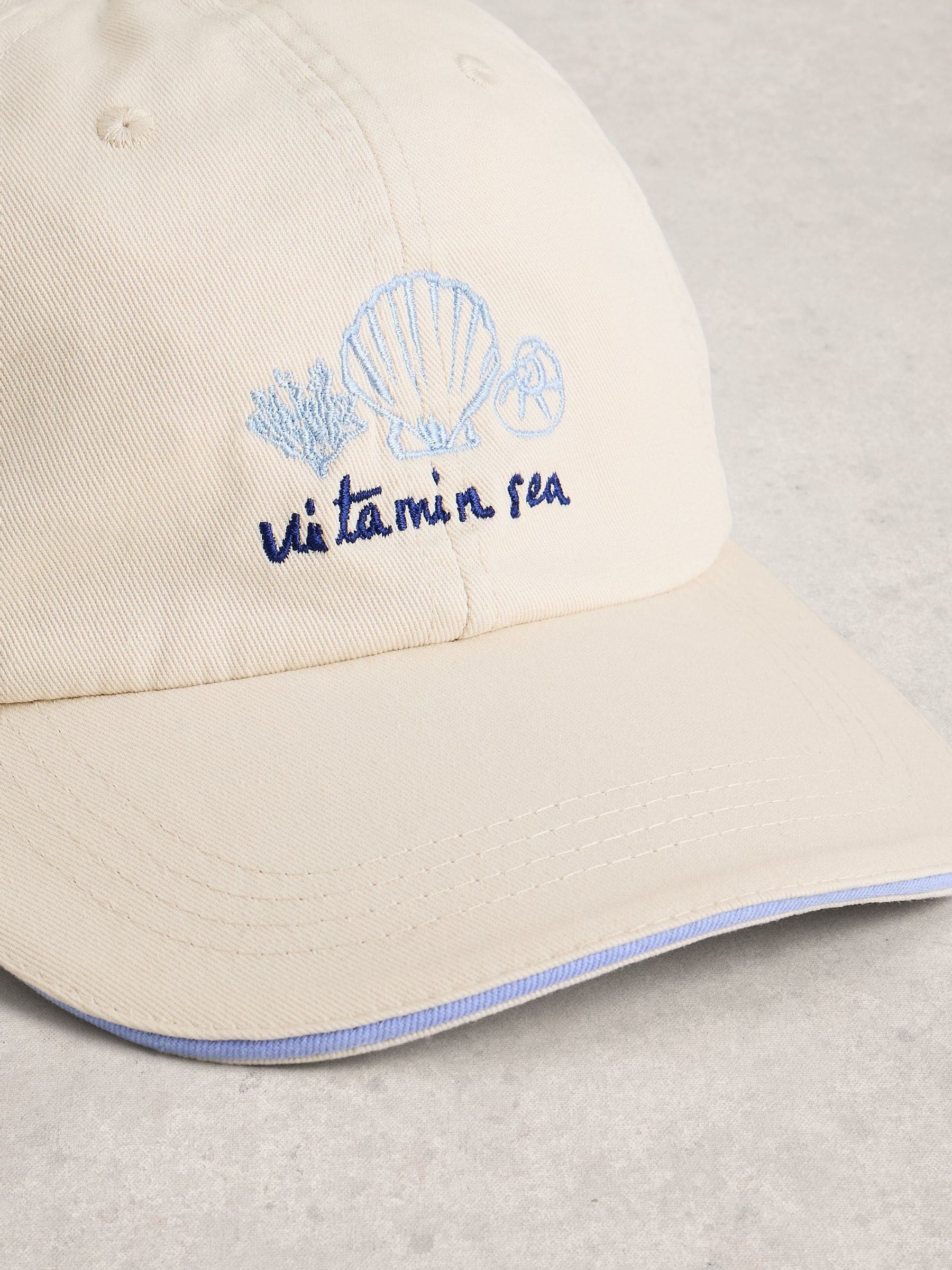 White Stuff natural embroidered shell cap (British brand)