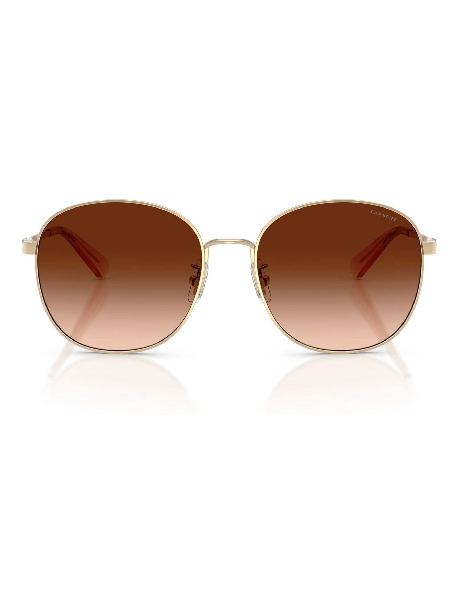 Coach gold round sunglasses with metal frames, imported from the UK